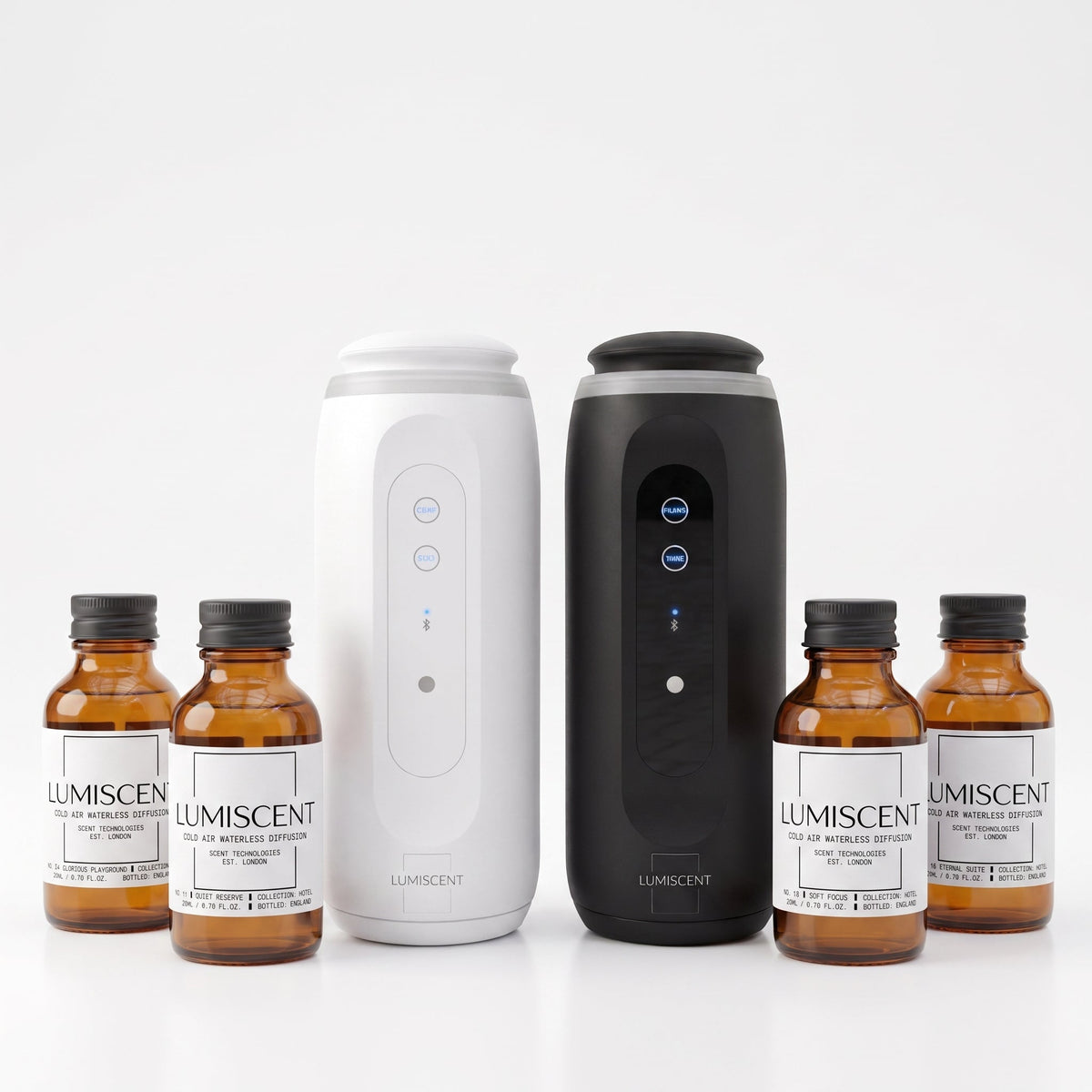 Two Lumiscent Glow diffusers with Hotel Collection fragrance oils